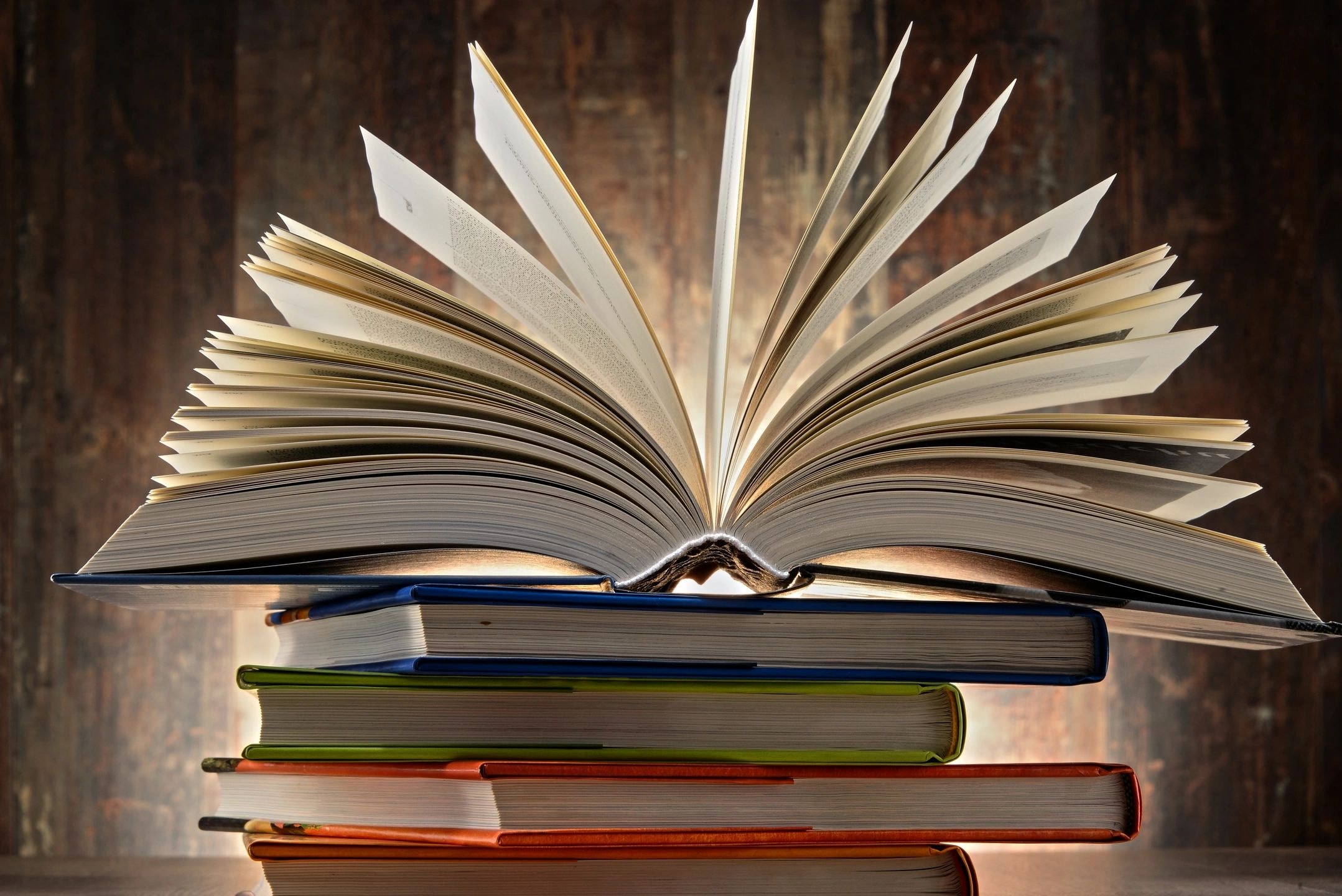 Stack of open books